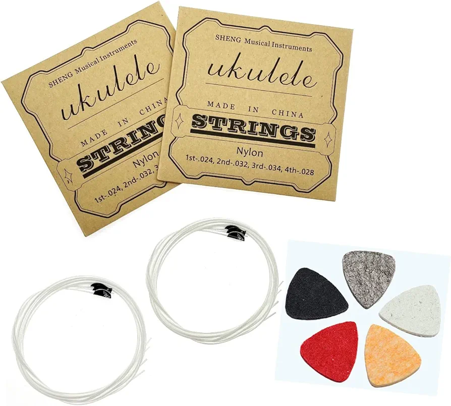 JZK Juego de 2 cuerdas de nailon blanco para ukelele con púas de fieltro para ukelele, A - 1, E - 2, C - 3, G - 4, 4 cuerdas por juego, accesorios para ukelele de concierto/soprano/tenor